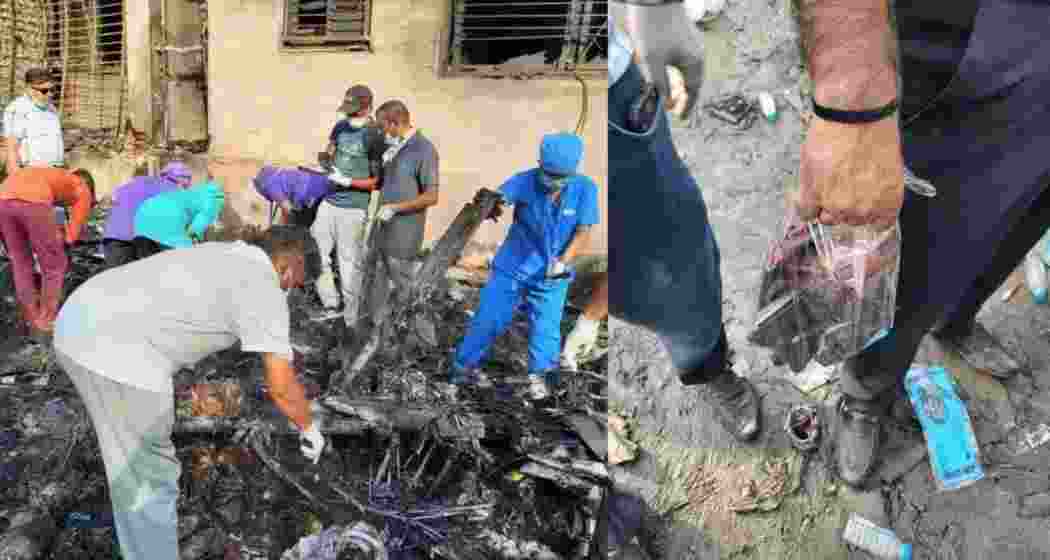 A fire officer stands next to the crashed Air India Boeing 787-8 Dreamliner aircraft, in Ahmedabad.