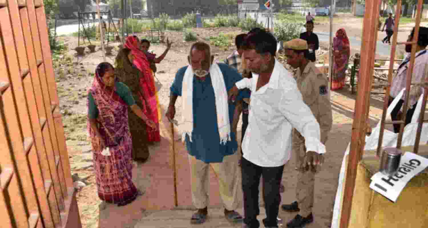 People turnout to caste their ballot in Gujarat local body polls. 