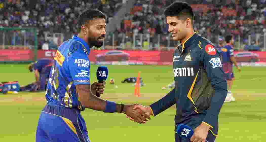 Shubman Gill and Hardik Pandya, Gujarat Titans and Mumbai Indians skippers, shake hands during an IPL fixture. (BCCI Photo)
