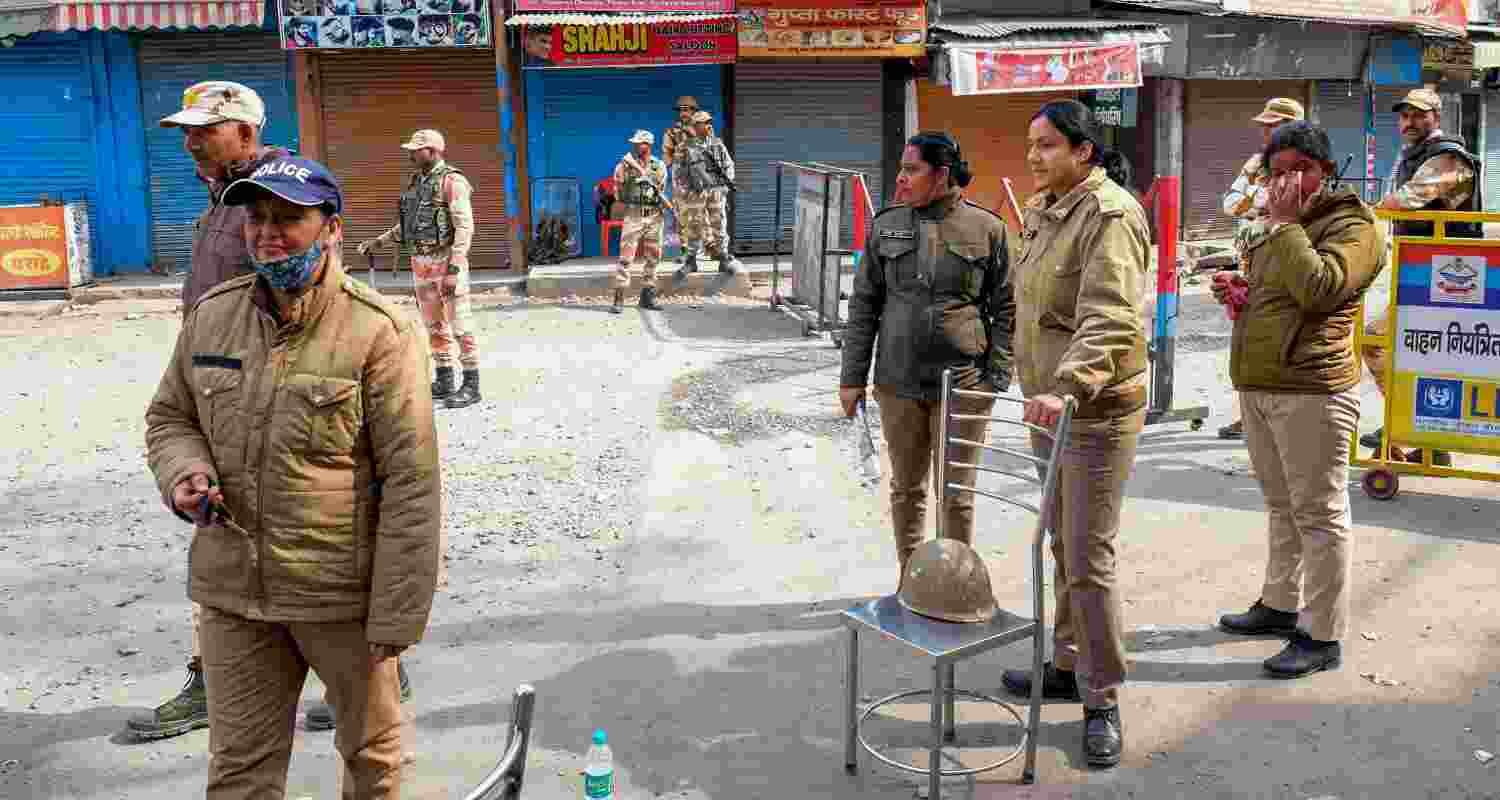 policemen outside shops in Haldwani
