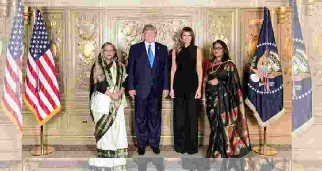 An undated photo featuring Sheikh Hasina, her daughter Saima Wazed, alongside Donald Trump and his wife Melania, shared by the Awami League on social media.
