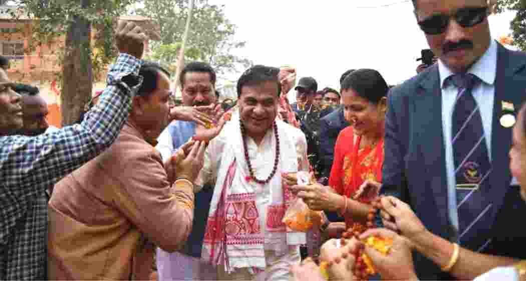 Himanta Biswa Sarma is greeted by supporters as the Assam BJP launches the ‘Jan Ashirwad Yatra’ ahead of the Assembly polls, in Dhekiajuli on Saturday.