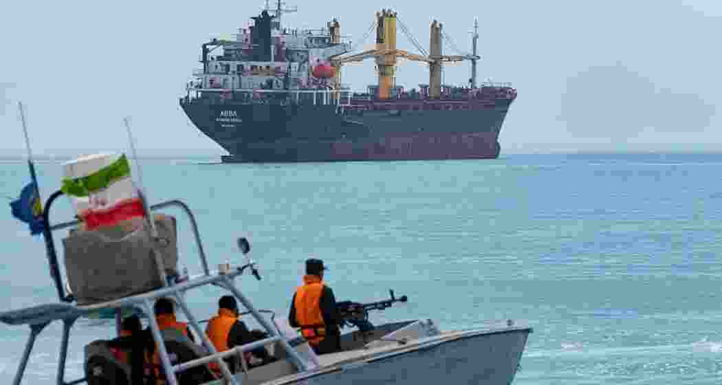 Cargo ships pass through the Strait of Hormuz, a key global shipping route, as India monitors movement of its vessels and ensures safe passage amid regional tensions. (Image: Getty images)
