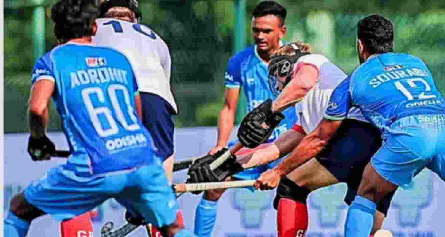 Indian strikers trying to find their way past the Great Britain goalkeeper during their match in Johor Bahru, Malaysia, on Saturday.
