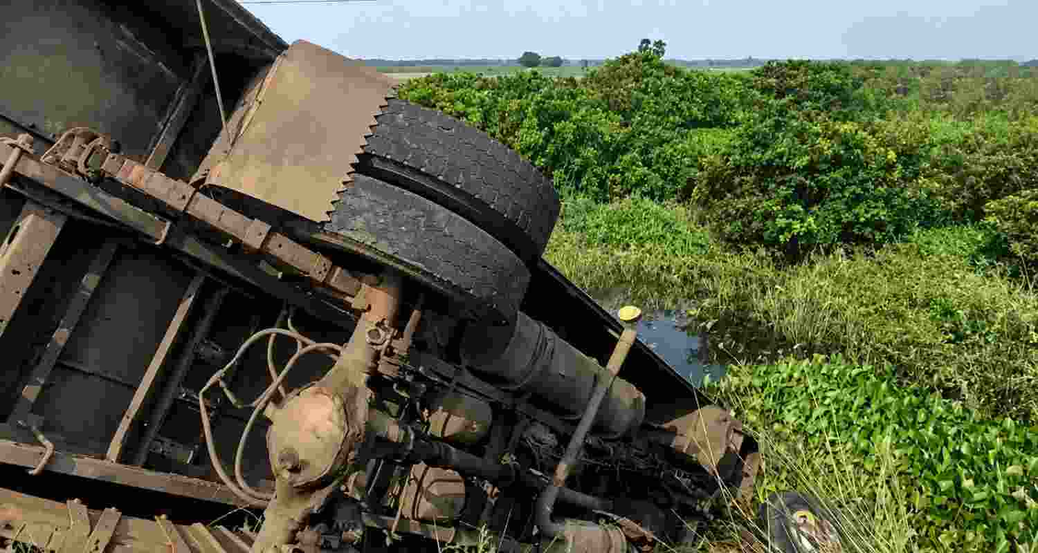 Two women were killed and at least 20 people injured after a passenger bus overturned into a roadside ditch in West Bengal's Hooghly district.