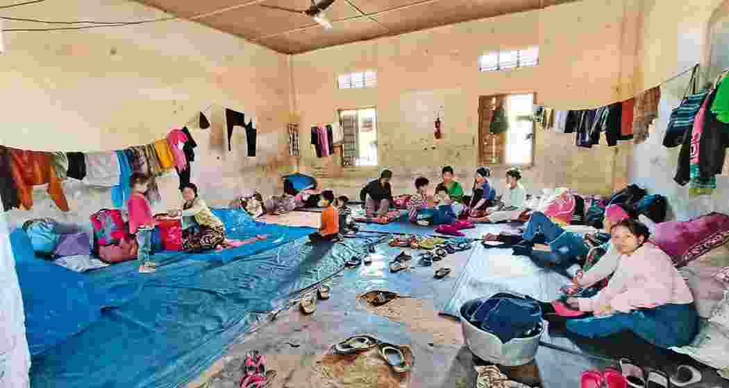 Internally displaced persons (IDPs) take shelter at a relief camp in violence-hit Manipur. PTI photo.