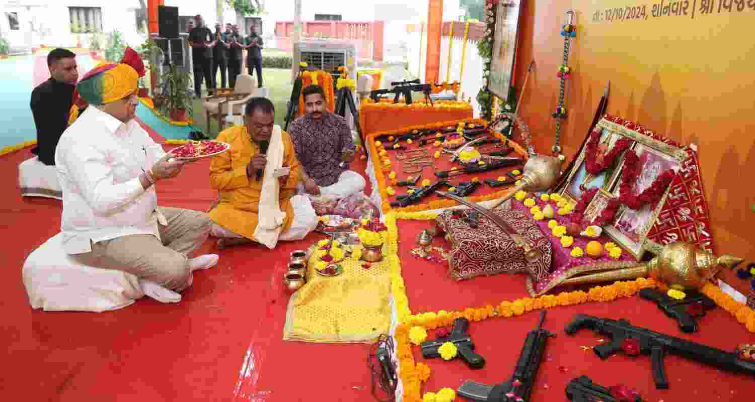 CM Patel Emphasises Duty During 'Shastra Pujan' Ceremony.