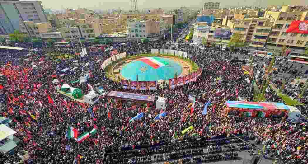 People gather at Tehran’s Azadi Street to mourn and honour top Iranian military commanders and scientists killed in Israeli airstrikes during the recent 12-day war.