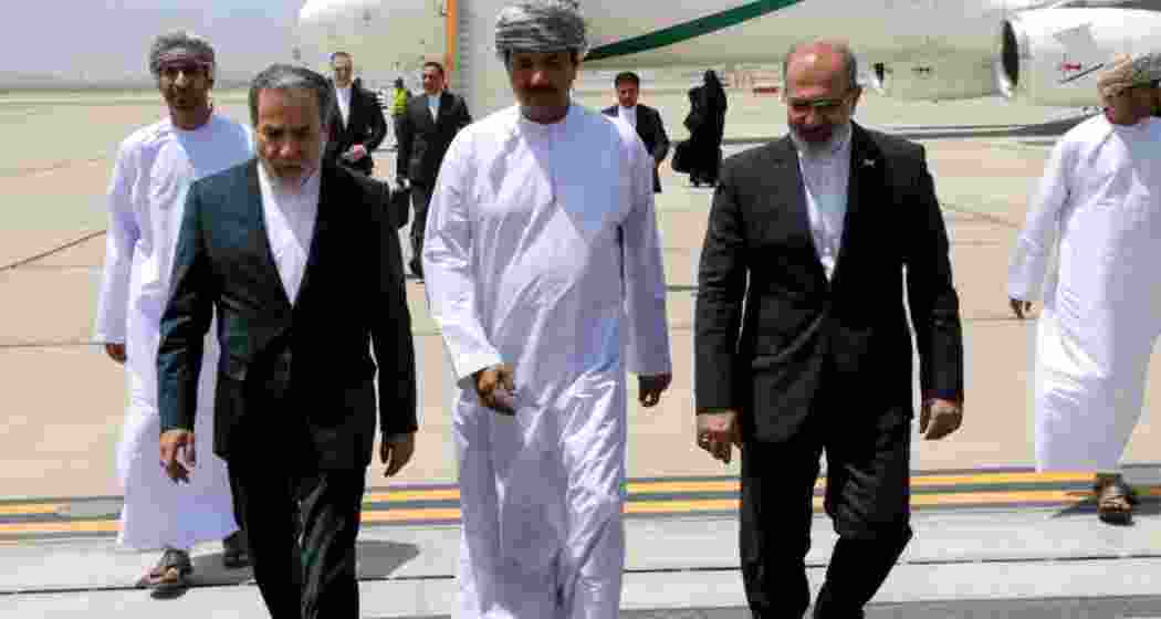Iran’s foreign minister, Abbas Araghchi (L), arrived in Oman on Sunday, 11 May, for talks with the US, which may have covered the idea of an enrichment consortium. 