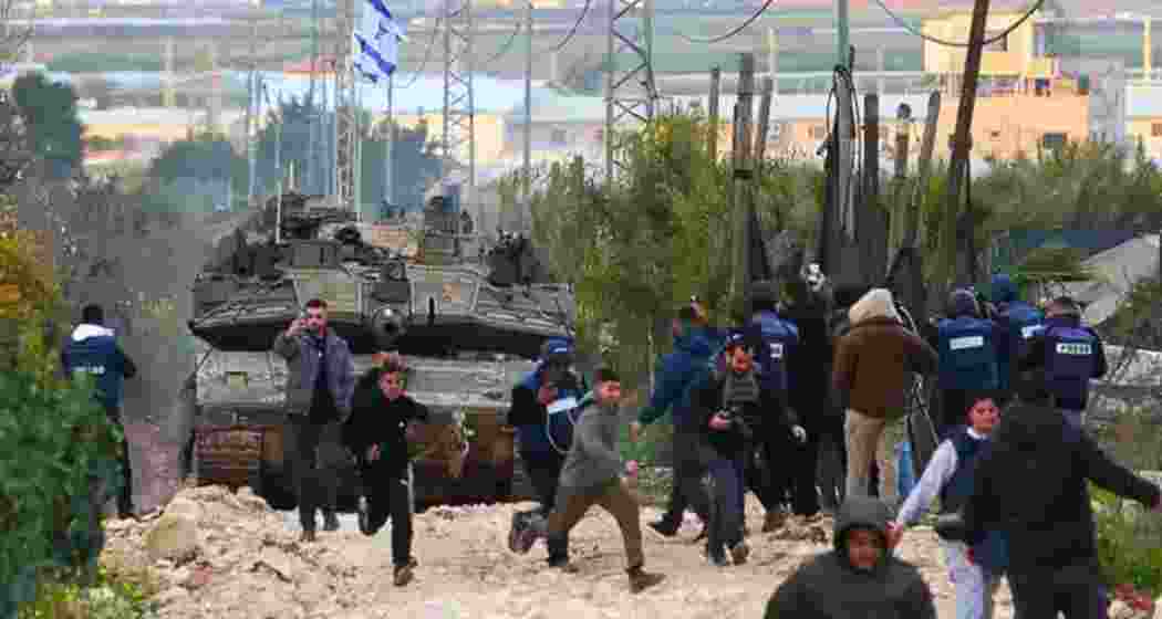 Civilians flee as Israeli tanks roll into the occupied West Bank for the first time in decades, amid escalating tensions and military operations in Palestinian refugee camps.