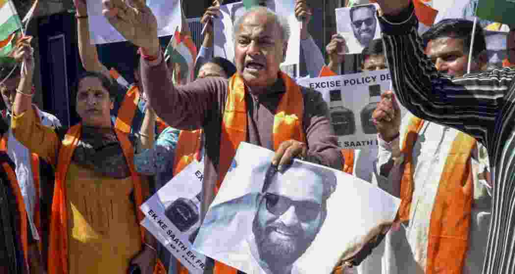 Members of the Shiv Sena Dogra Front protest against Aam Aadmi Party (AAP) MLA Mehraj Malik over his alleged objectionable remarks against a particular religion in the Jammu and Kashmir Assembly, in Jammu, Friday, March 21, 2025. Members of the Shiv Sena Dogra Front protest against Aam Aadmi Party (AAP) MLA Mehraj Malik over his alleged objectionable remarks against a particular religion in the Jammu and Kashmir Assembly, in Jammu, Friday, March 21, 2025.