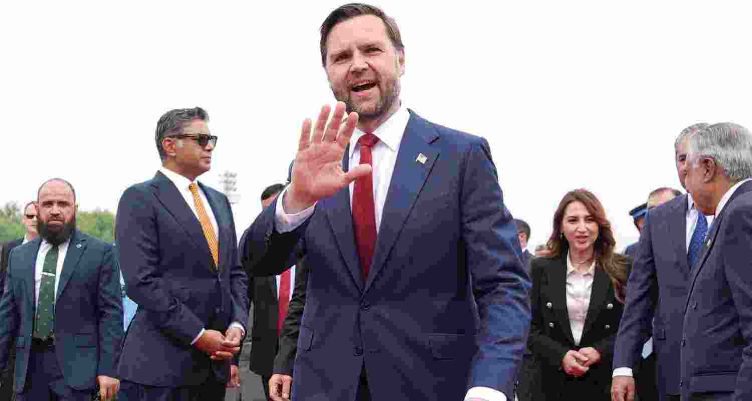US Vice President JD Vance, center, waves after arriving for talks with Iranian officials in Islamabad, Pakistan, Saturday, April 11, 2026.