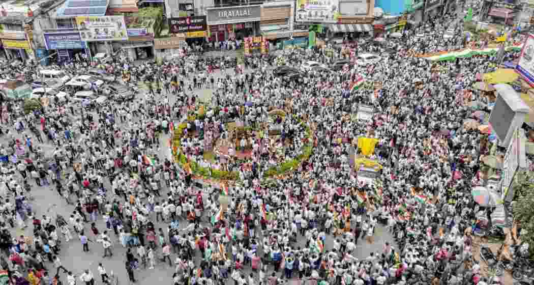 A drone view shows job aspirants and students taking out a massive ‘Tiranga Yatra’ procession to protest against the Jharkhand government over the JPSC and JSSC-CGL exam paper leak issues at Albert Ekka Chowk, in Ranchi, on August 15.