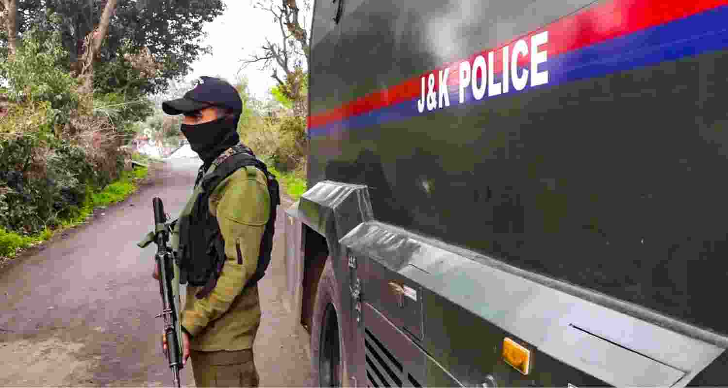 A security personnel stands guard during a search operation to flush out terrorists who opened fire on an Army vehicle the previous day, near the Line of Control (LoC) in the Sunderbani sector of J&K's Rajouri district. 