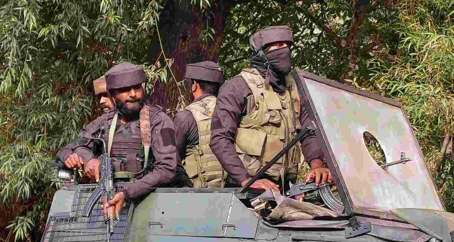 Anti Terror Squad of the J&K Police in a Gypsy vehicle,