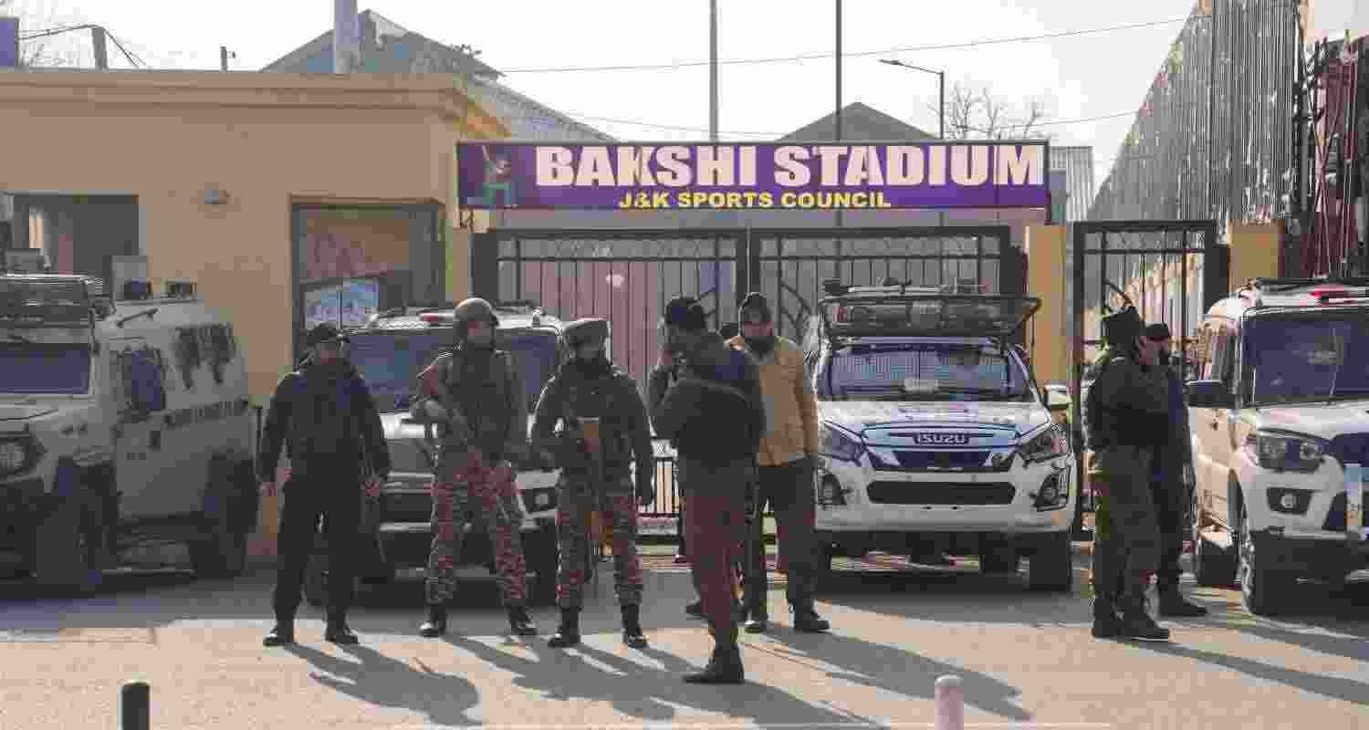 Security personnel stand guard during full dress rehearsal for Republic Day Parade 2025, in Srinagar, Friday. 