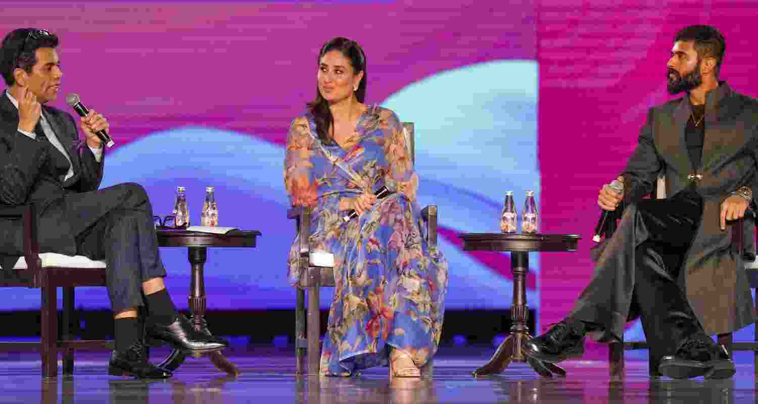 Bollywood filmmaker Karan Johar with actors Kareena Kapoor Khan and Vijay Devarakonda during a session ‘Cinema: The Soft Power’ at WAVES 2025, in Mumbai, Friday.