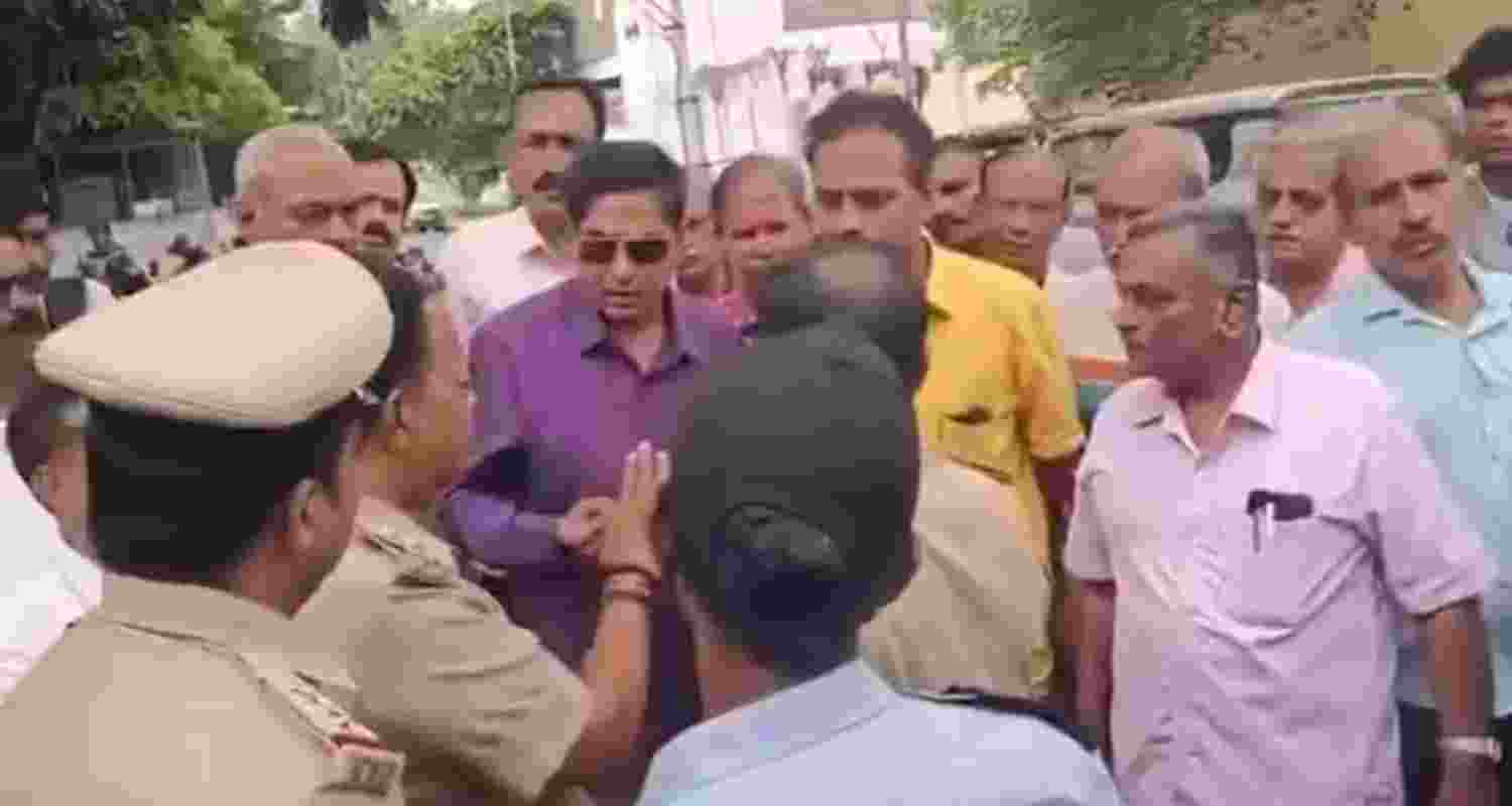 Two suspended for forcing students to remove sacred thread