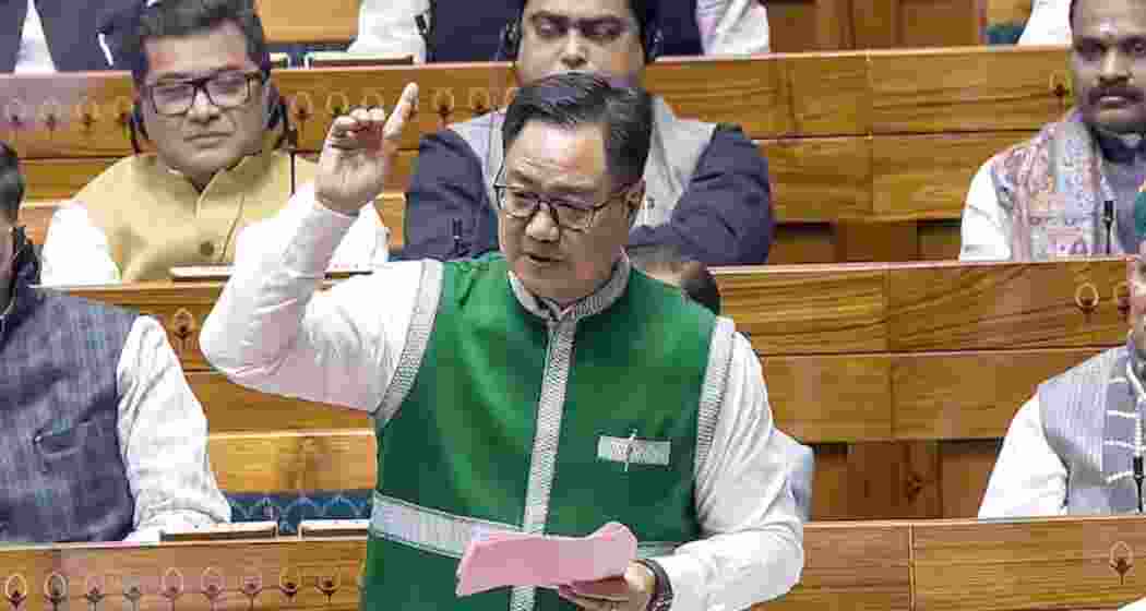 Union Minister for Parliamentary Affairs and Minority Affairs Kiren Rijiju speaks in the Lok Sabha during the Winter session of Parliament.
