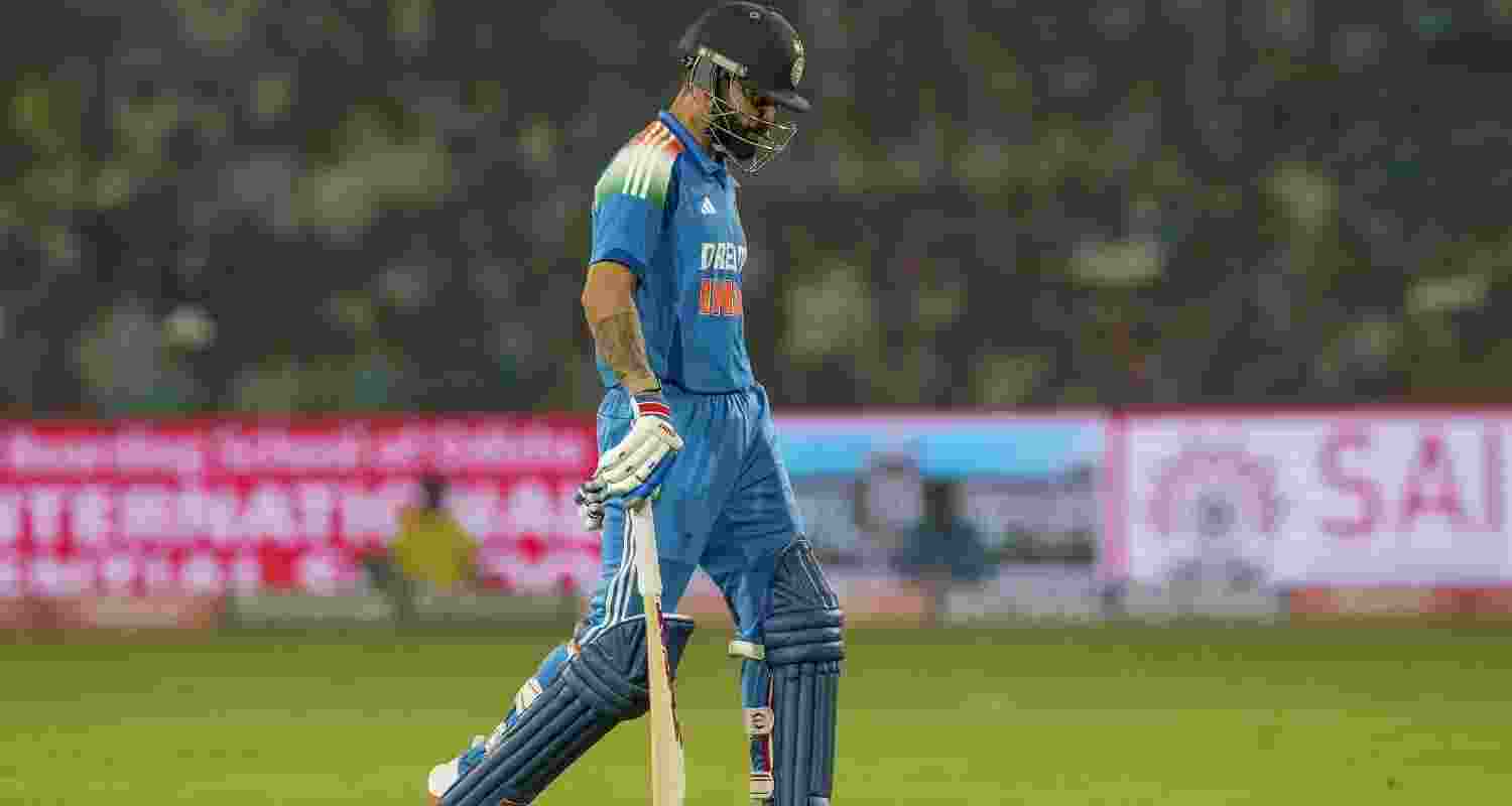 Virat Kohli departs after a brief innings against England in the 2nd ODI, where he scored 5 runs.