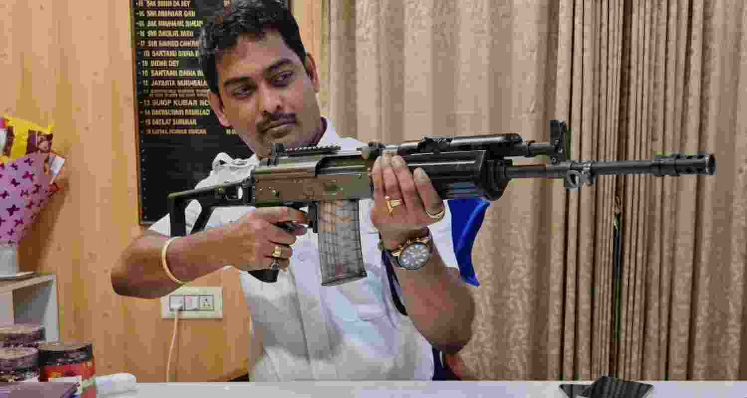 Kalighat OC Gautam Das suspended over firearm photo post during polls; TMC flags conduct, Kolkata Police orders probe amid rising controversy.
