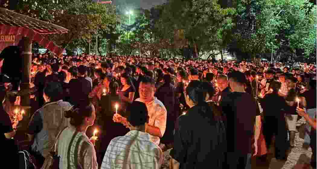 Members of the Kuki Students’ Organisation Delhi & NCR participate in a candlelight vigil in Delhi on May 13 to protest the killing of church leaders in Manipur and express solidarity with the bereaved families. (Photo: KSO)