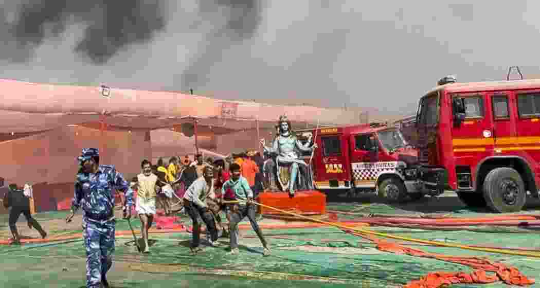 Firefighters, along with pilgrims and locals battle a blaze at Mahakumbh Mela Kshetra in Prayagraj on Friday. The incident follows a fire last week in the Chatnag Ghat area.