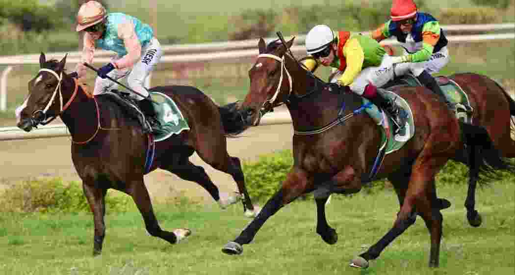 Indian runners in action, pushing the pace during a competitive heat.