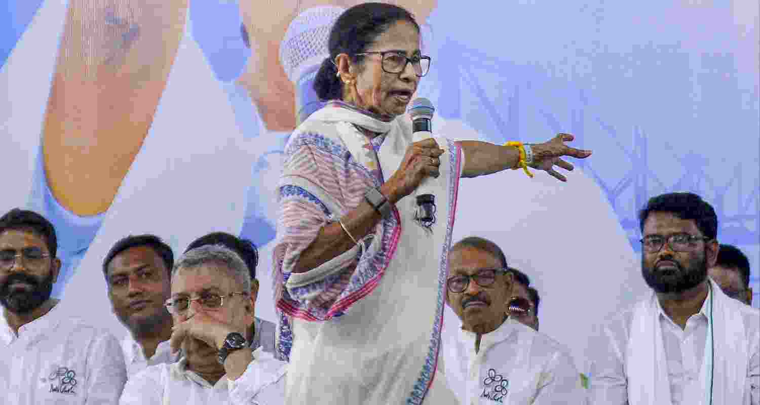 West Bengal Chief Minister Mamata Banerjee addresses a public meeting ahead of the Assembly elections, in Howrah, Tuesday, April 14, 2026.