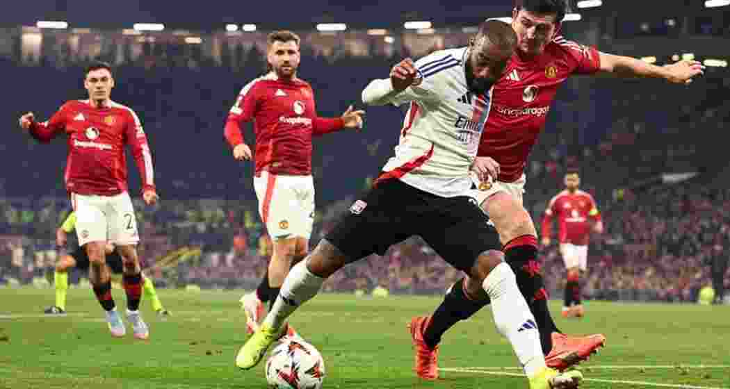 Manchester United and Real Madrid players fight for the ball during an tense moment in their UEFA clash at Old Trafford on Thursday.