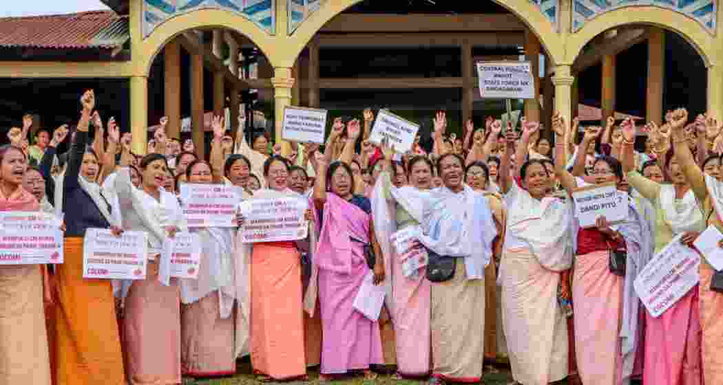 Women protest demanding justice for the victims of the April 7 bomb attack, in which three civilians were killed, in Imphal East on Thursday. (Photo: ANI)
