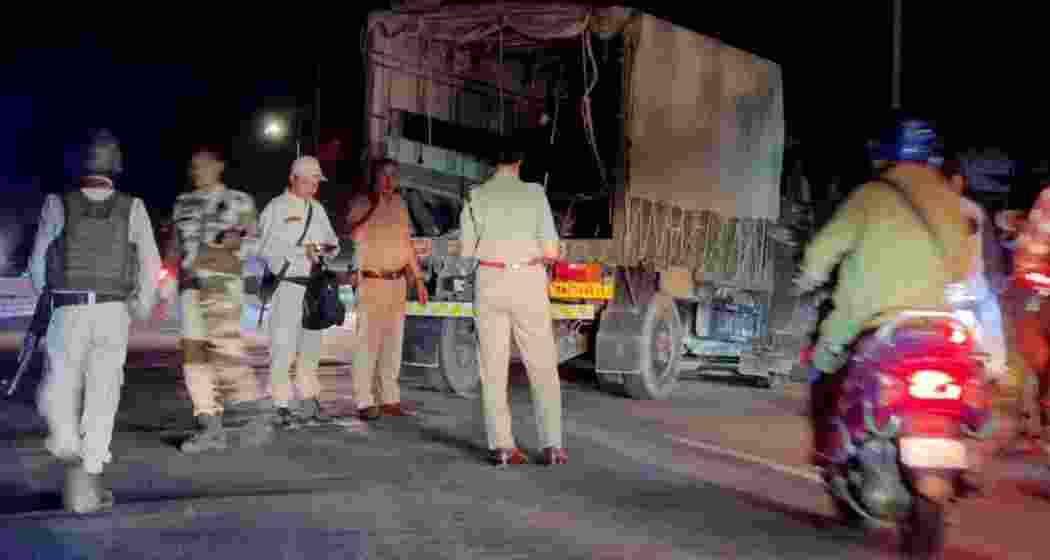 Security forces in Manipur inspect the site of the September 19 ambush where Assam Rifles personnel were attacked.