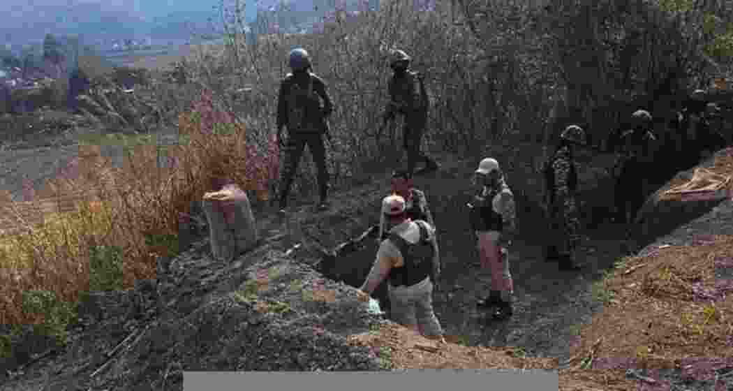Security personnel during a search operation in Manipur’s hill districts after a gunfight in Bishnupur and the dismantling of illegal bunkers in Ukhrul amid ongoing tensions.