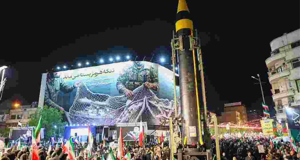 A ballistic missile is displayed by Iran's Revolutionary Guard during a pro-government demonstration at Enqelab-e-Eslami (Islamic Revolution) Square in downtown Tehran, Iran on Wednesday.