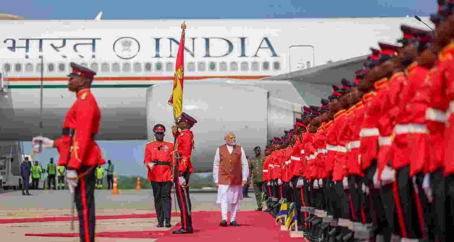 Prime Minister Narendra Modi inspects a Guard of Honour during a ceremonial welcome upon his arrival at Kotoka International Airport in Accra, Ghana.