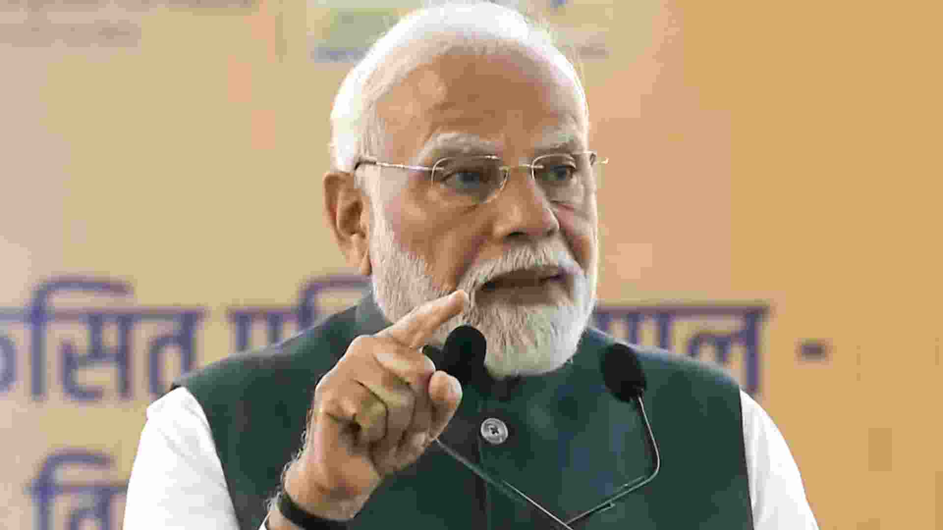 Prime Minister Narendra Modi addresses the gathering during the foundation stone laying for city gas distribution project, in Alipurduar, West Bengal.