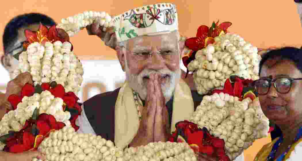 Prime Minister Narendra Modi addresses a public meeting ahead of the state Assembly elections, in Samastipur district, Friday.