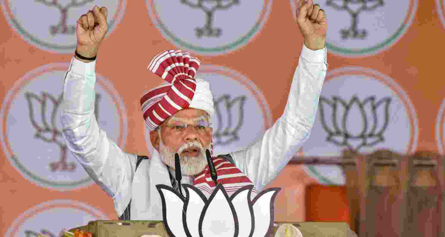 Prime Minister Narendra Modi addresses a gathering at a public meeting for the Lok Sabha polls, in Gumla district on Saturday.
