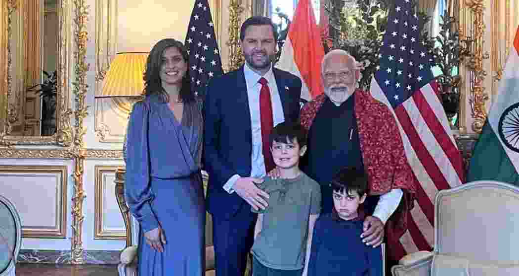 PM Narendra Modi with US Vice President JD Vance and family during his visit to France for the AI Action Summit, where he presented a handcrafted wooden alphabet set to Vance’s daughter.