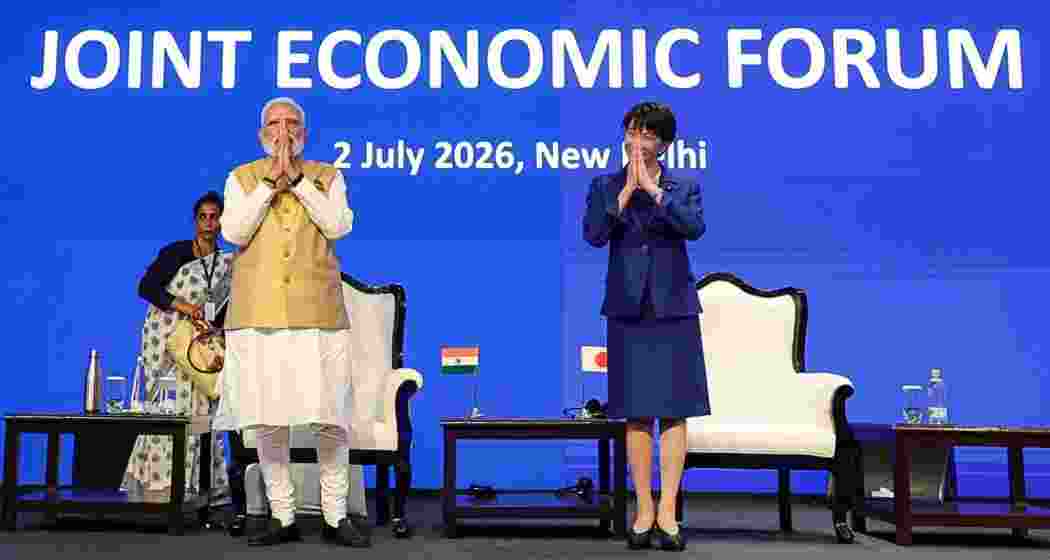 Prime Minister Narendra Modi and Japanese Prime Minister Sanae Takaichi greet the gathering at the India-Japan Joint Economic Forum, in New Delhi on Thursday.