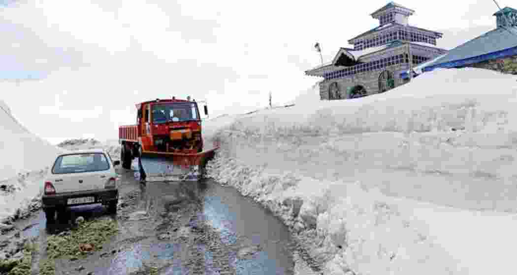 Local authorities closed the Mughal Road in Jammu and Kashmir on Saturday after fresh snowfall. Snow-clearing vehicles work to clear the road, ensuring safe passage for travellers amid heavy rain and wintry conditions in the region.