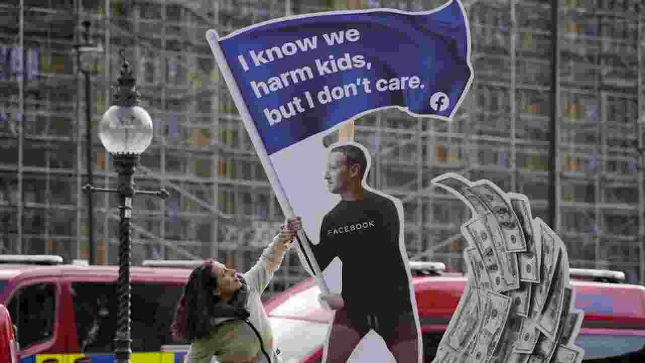 A protestor at an installation outside Westminster in London in October 2021, shortly before Facebook whistleblower Frances Haugen testified about the company’s pursuit of profit.