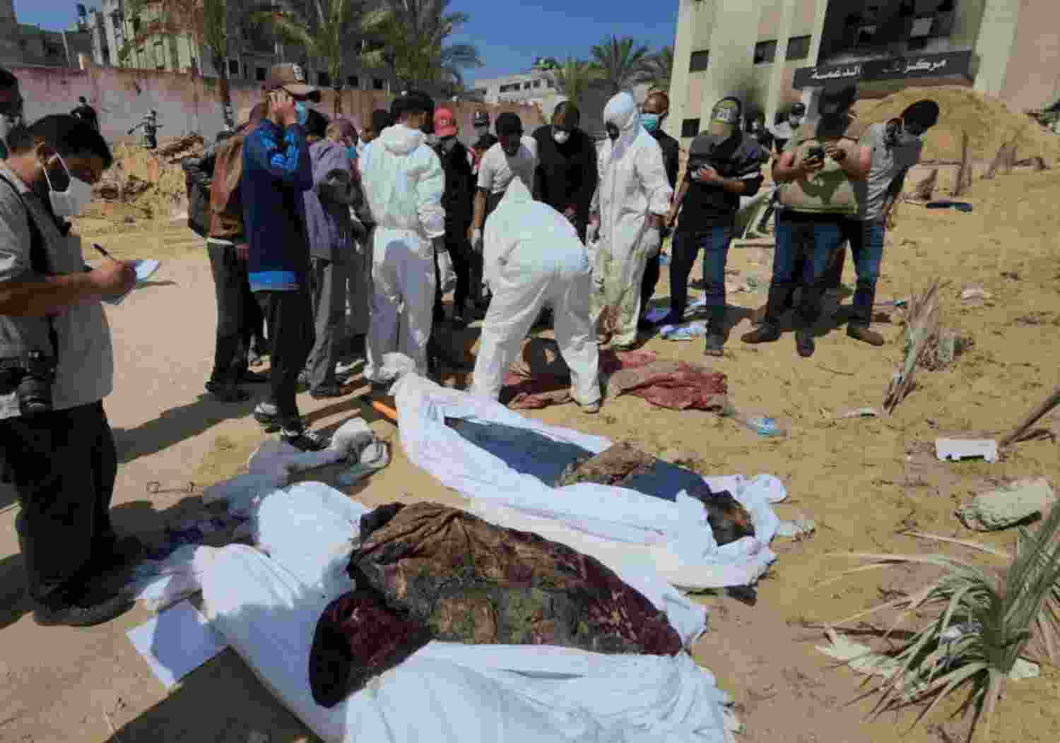 Dozens of decomposed bodies found buried at Nasser Hospital in Gaza after Israeli raid