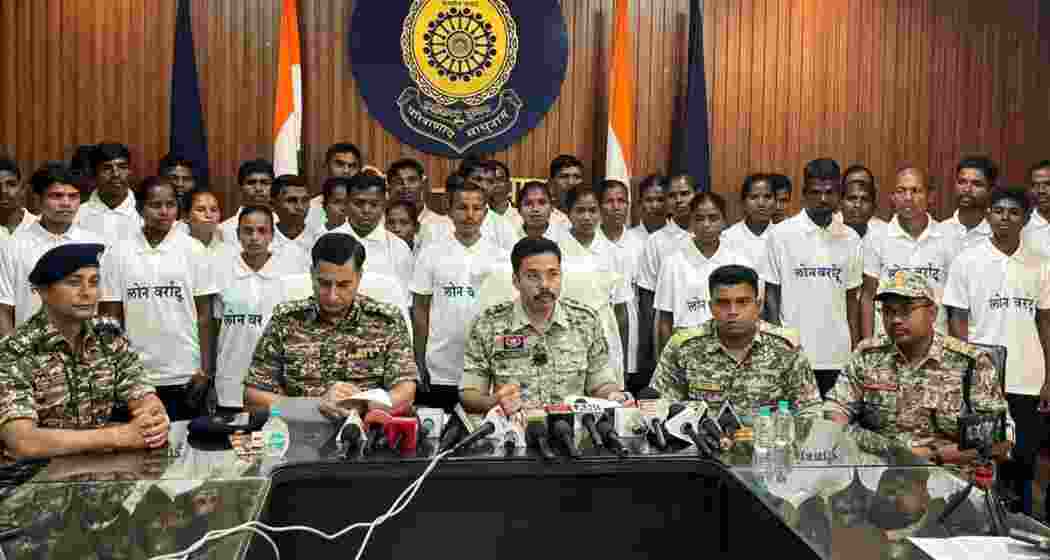 File photo of Superintendent of Police (SP) Gaurav Rai with 37 surrendered Maoists in Dantewada earlier on November 30, 2025. 