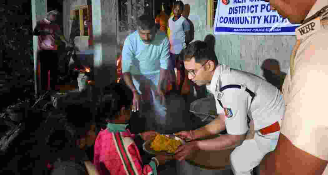 Relief materials being distributed to flood-affected residents in Alipurduar.