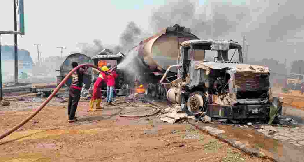 The aftermath of a fuel tanker explosion in Niger State, where 70 people died while collecting spilt gasoline. 