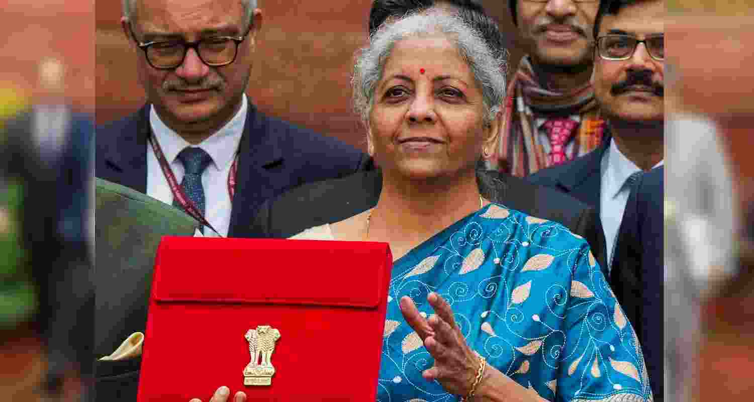 Union Finance Minister Nirmala Sitharaman with Ministers of State Bhagwat Kishanrao Karad and Pankaj Chaudhary, and other officials outside the Finance Ministry ahead of the presentation of Interim Budget 2024, in New Delhi, Thursday