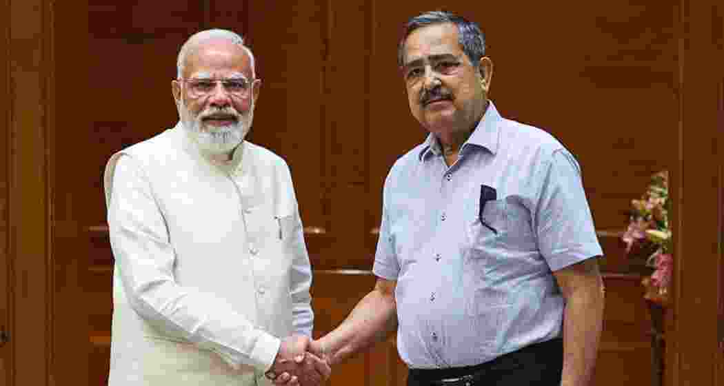 PM Narendra Modi with Ashok Lahiri after his appointment as vice-chairman of NITI Aayog in New Delhi on Saturday.