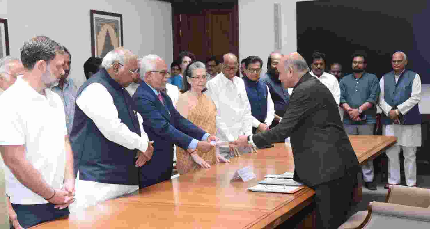 INDIA bloc vice presidential candidate B Sudershan Reddy files his nomination, in New Delhi, Thursday. Congress President Mallikarjun Kharge, party leader Sonia Gandhi and NCP (SP) chief Sharad Pawar are also seen. 