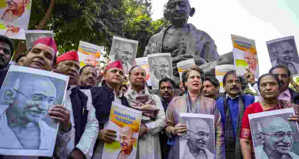 Congress MP Priyanka Gandhi Vadra, Samajwadi Party MP Akhilesh Yadav, DMK MP T.R. Baalu and other opposition MPs stage a protest near the statue of Mahatma Gandhi against the VB-G RAM G Bill, introduced by the union government to replace the Mahatma Gandhi National Rural Employment Guarantee Act (MGNREGA), 2005, during the Winter Session of Parliament, in New Delhi, on Dec. 16, 2025. (Photo: PTI /Salman Ali)